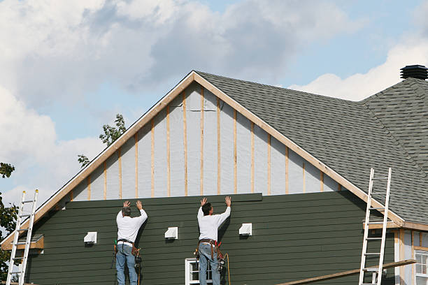 Professional Siding Installation technician working in Fultonham, OH